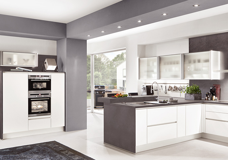 nobilia's soft white kitchen cabinets with gray color splashes